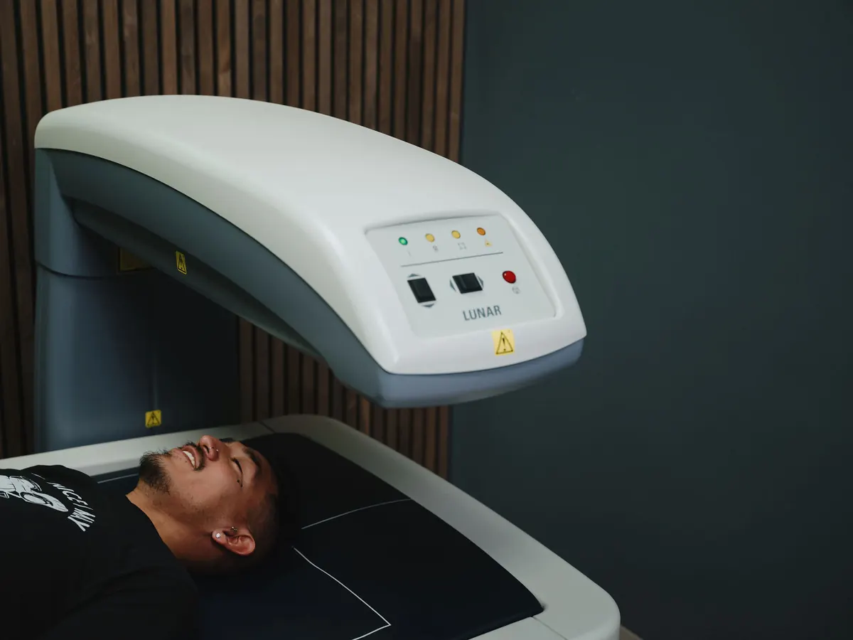 Patient lying on the DEXA scanner table