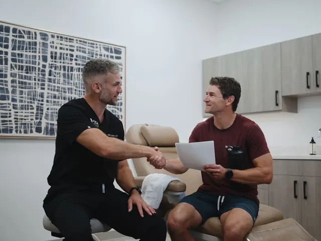 Dr. Lyall shaking hands with a patient after a consultation