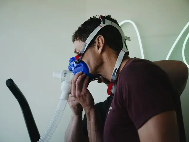 Patient wearing a VO2 max mask on the treadmill